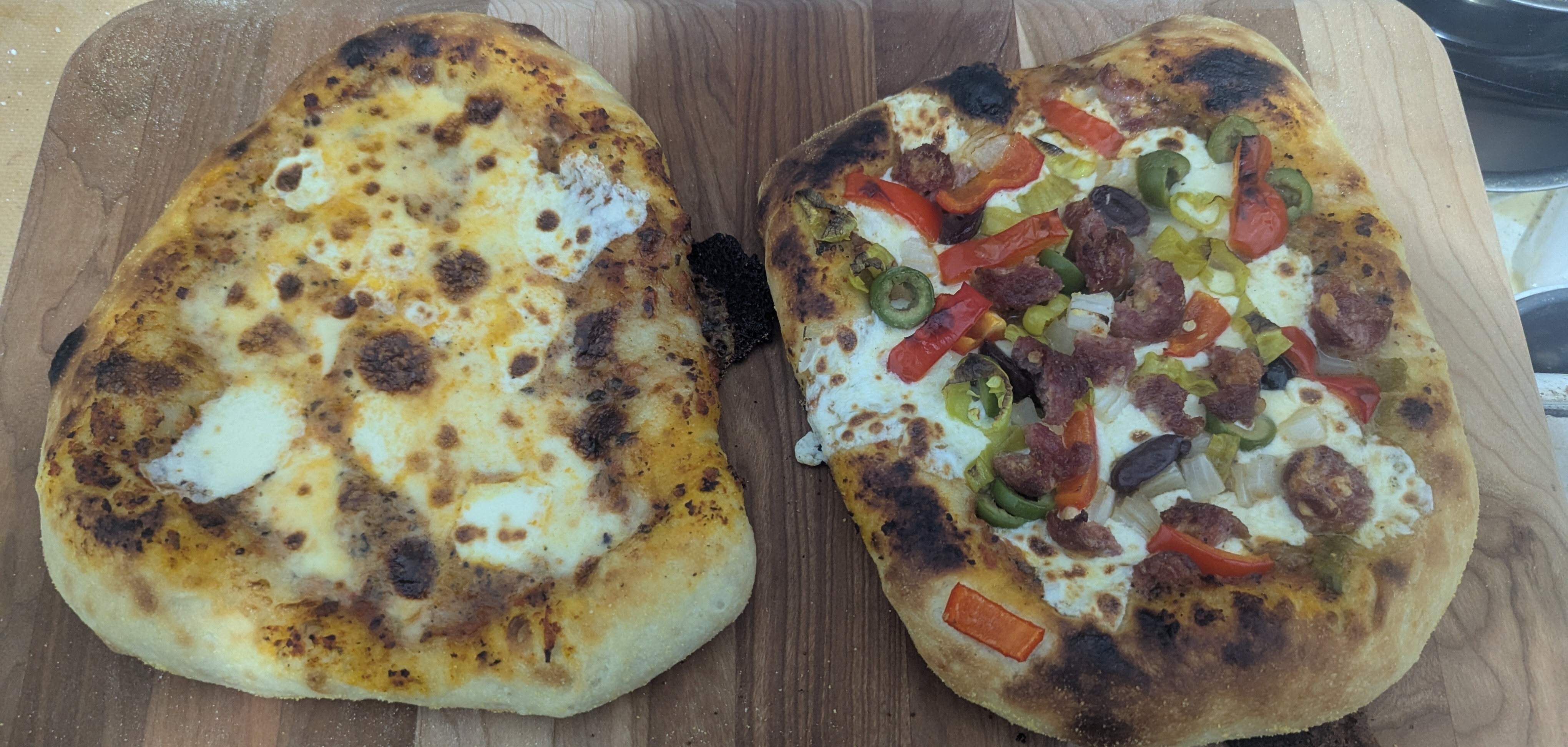 Header image of baked pizzas